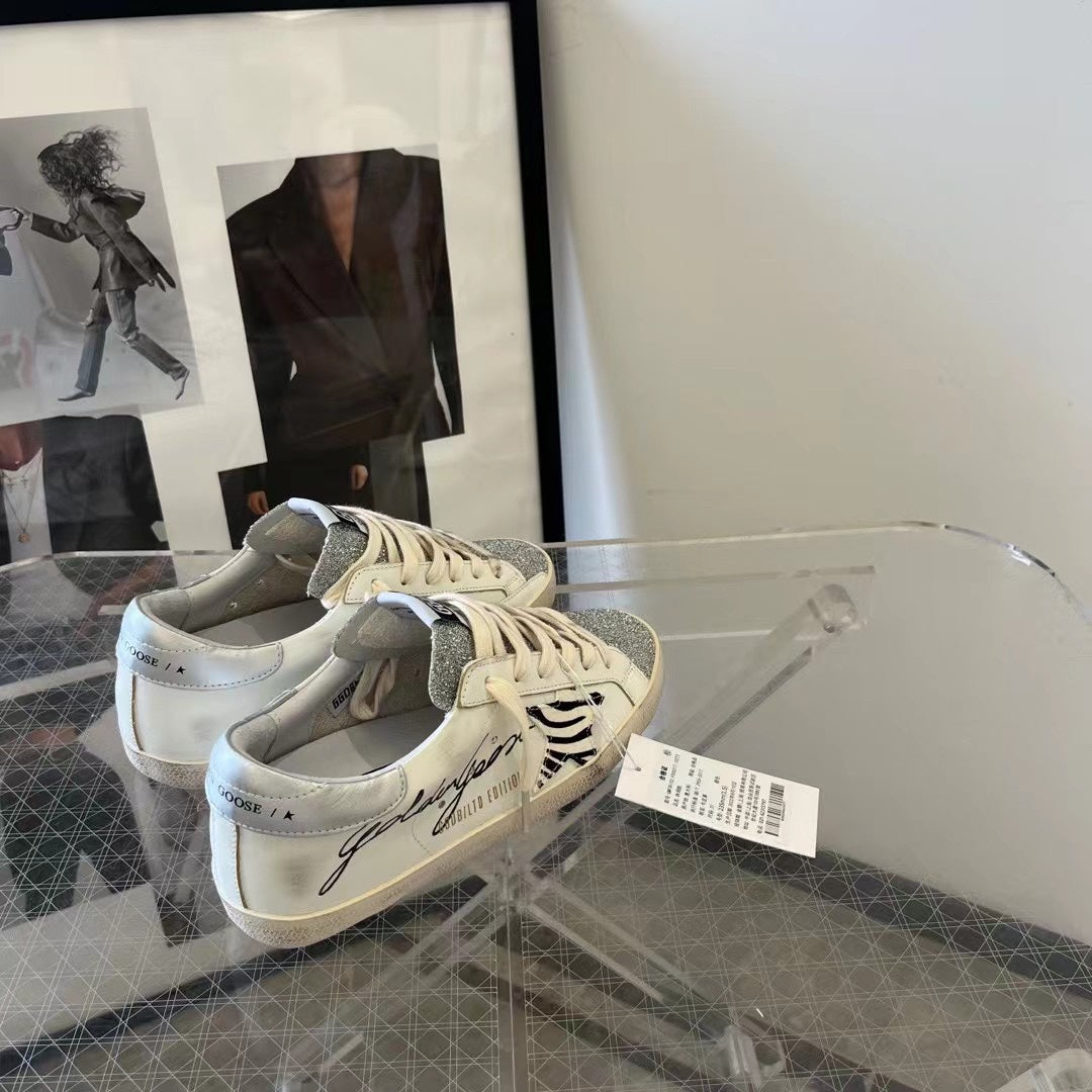 Golden Goose Vintage Distressed Sneakers #087