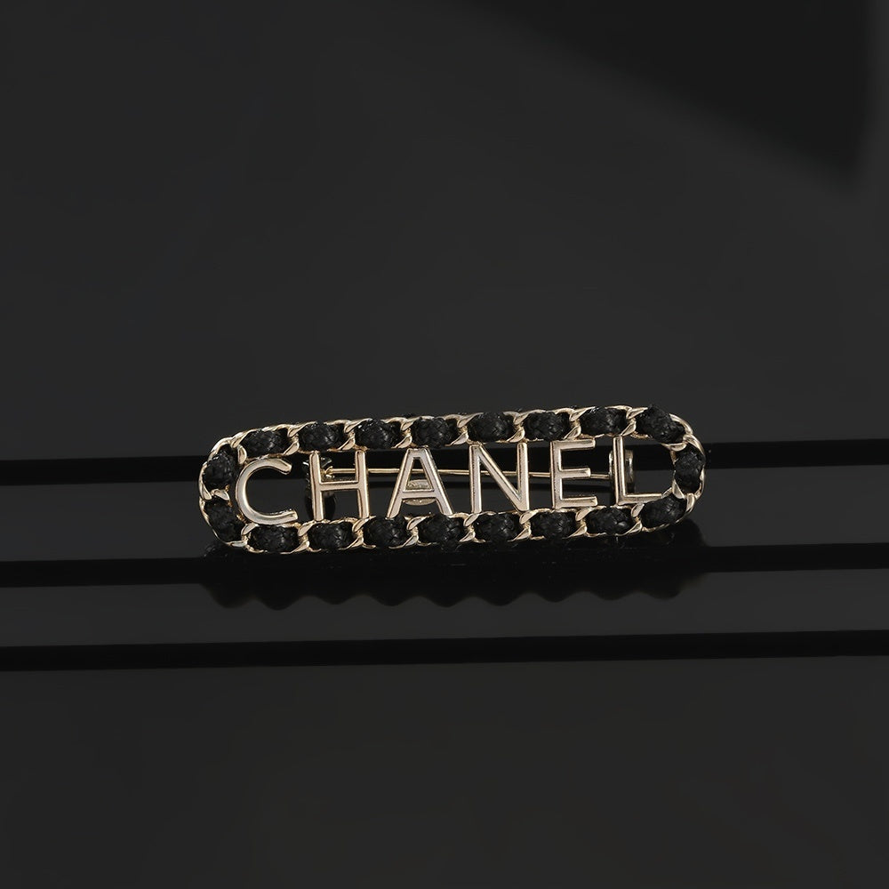 Chanel Leather Brass Brooch
