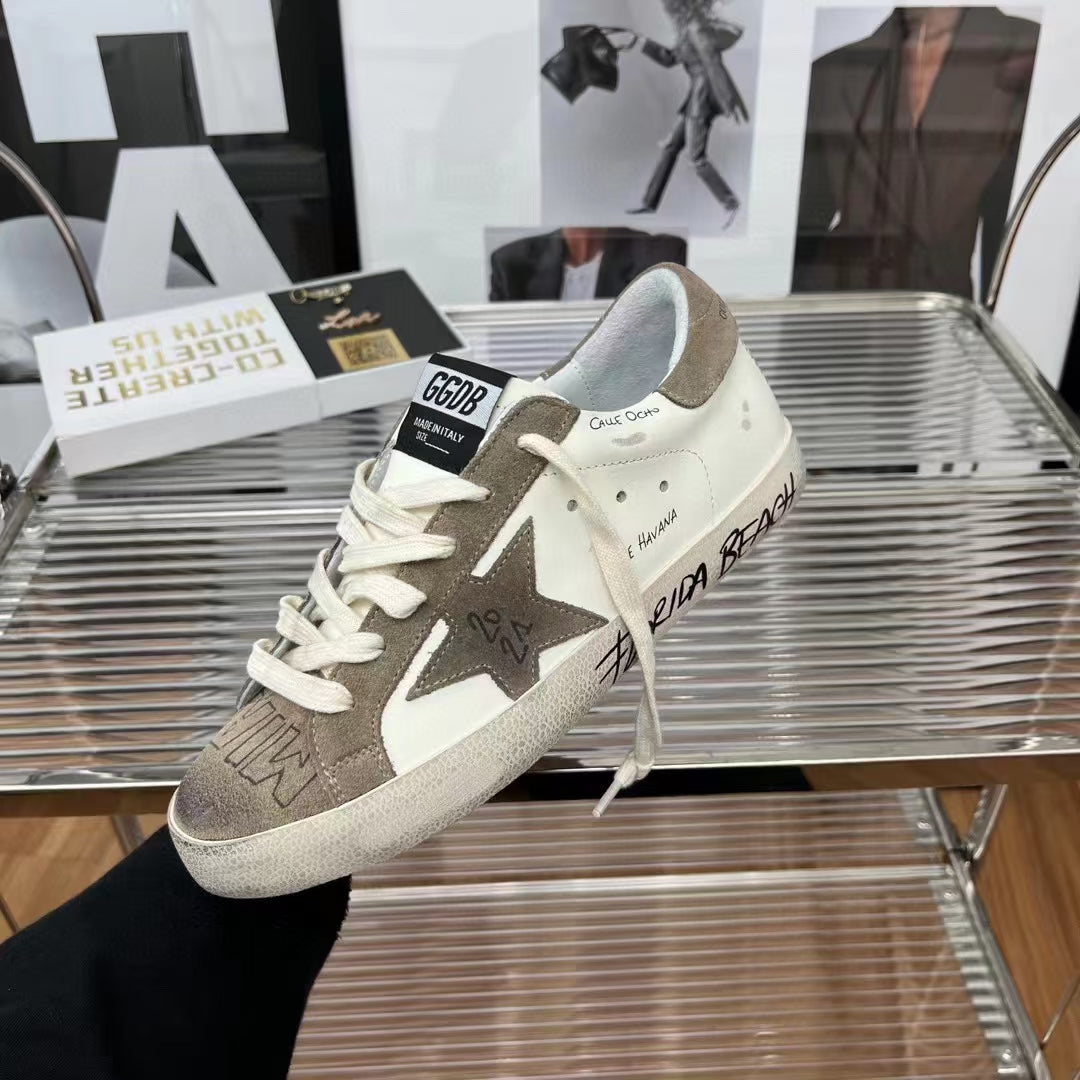 Golden Goose Vintage Distressed Sneakers #318
