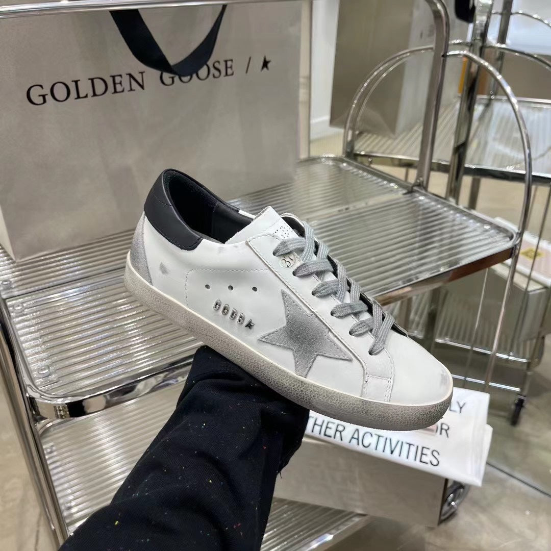 Golden Goose Vintage Distressed Sneakers #323