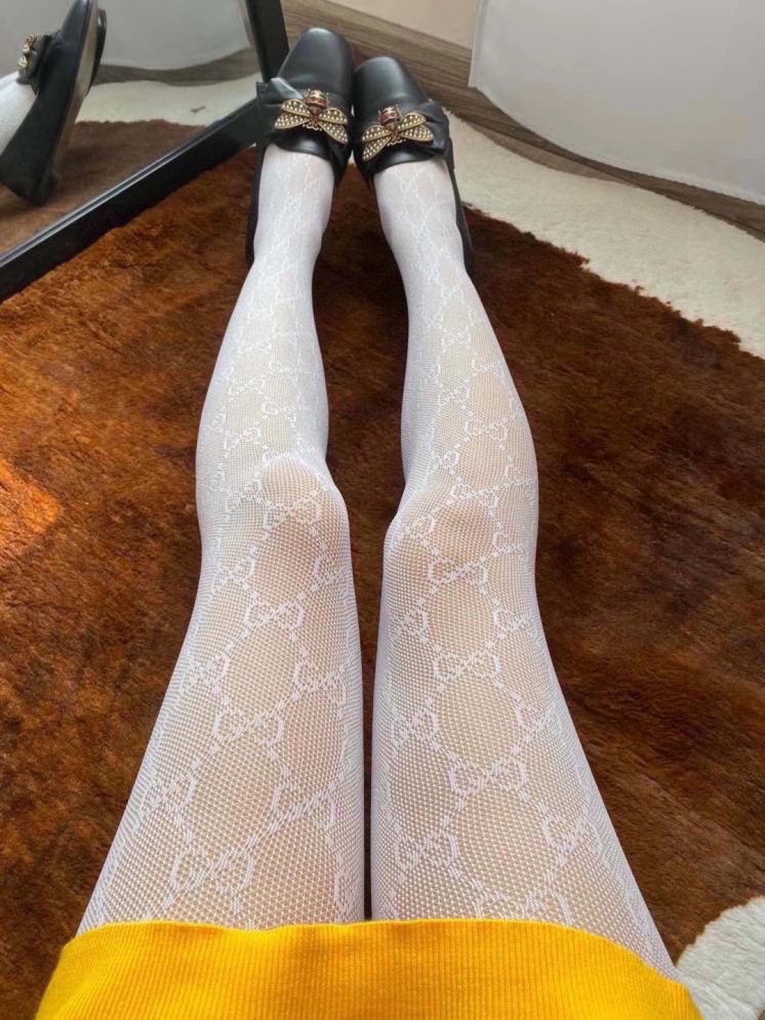 Gucci One-piece fishnet bodysuit