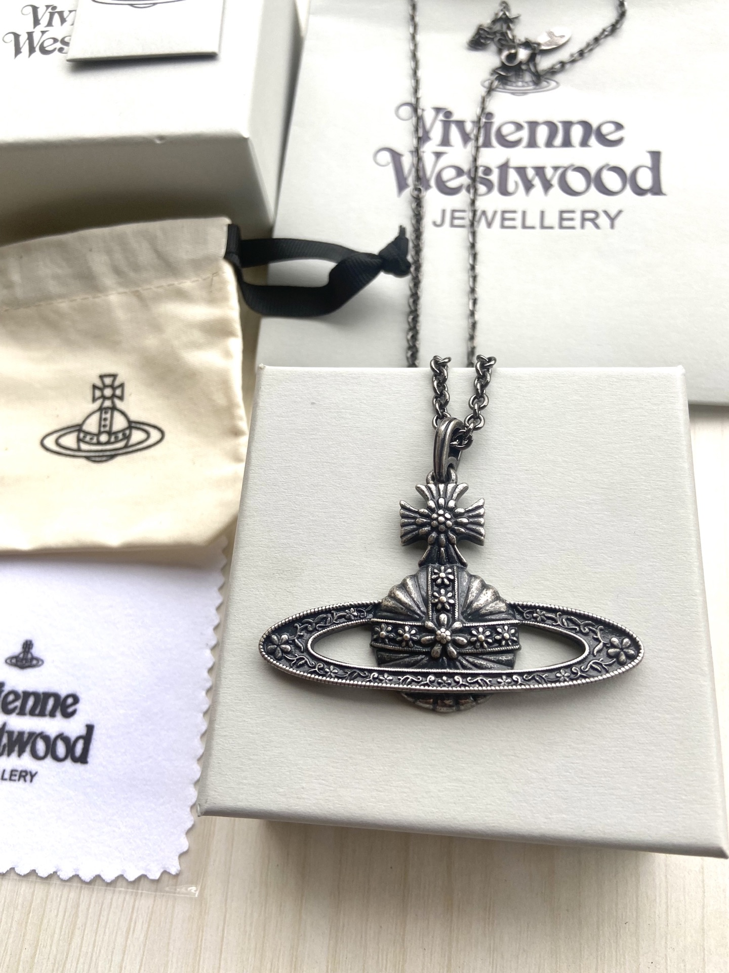 Black Engraved Saturn Necklace