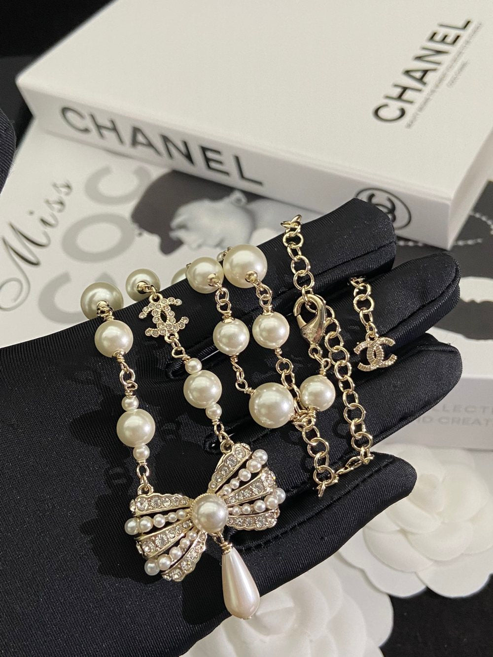 Chanel Pearl Bow Earrings
