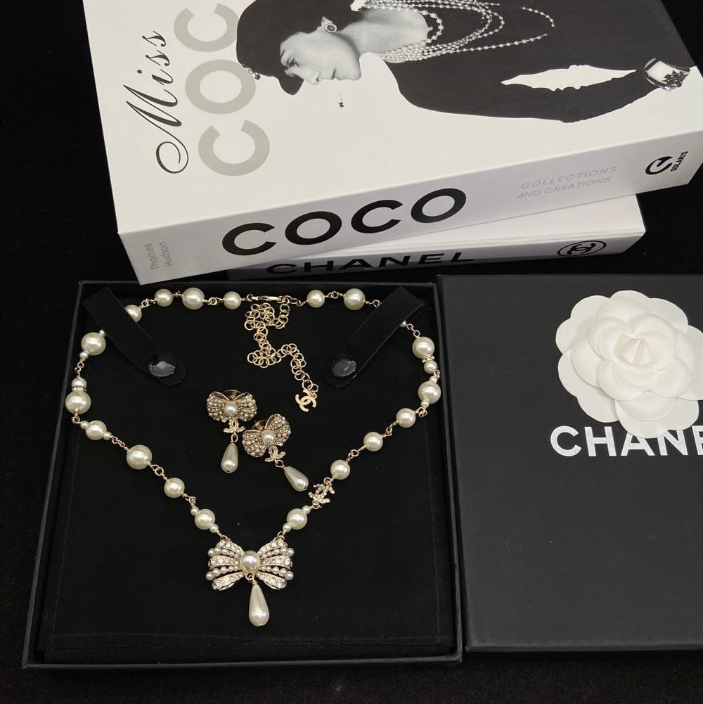 Chanel Pearl Bow Earrings