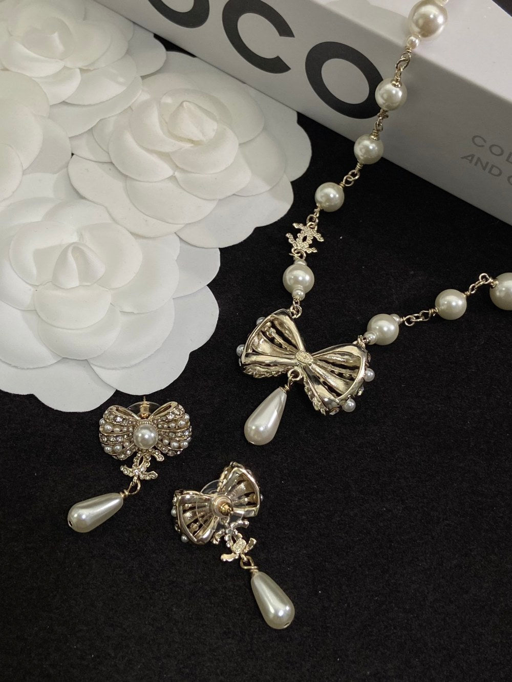 Chanel Pearl Bow Earrings