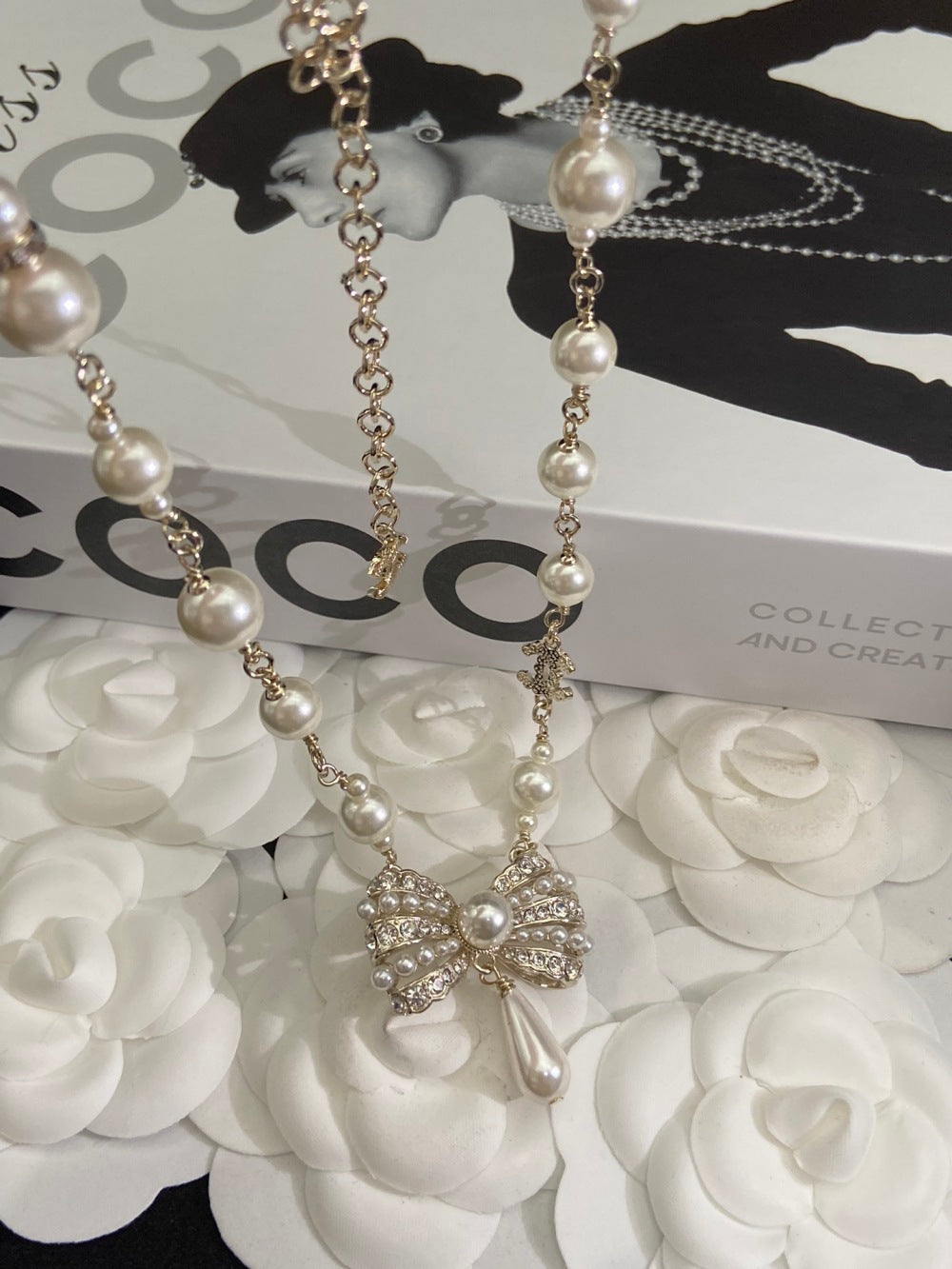 Chanel Pearl Bow Earrings
