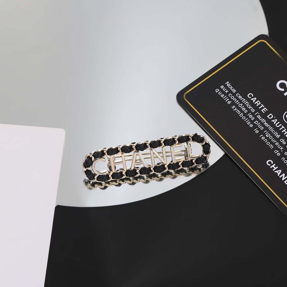 Chanel Leather Brass Brooch