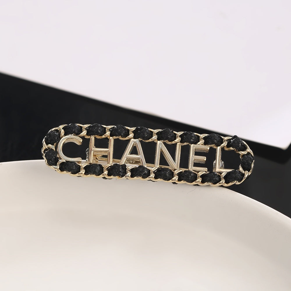 Chanel Leather Brass Brooch