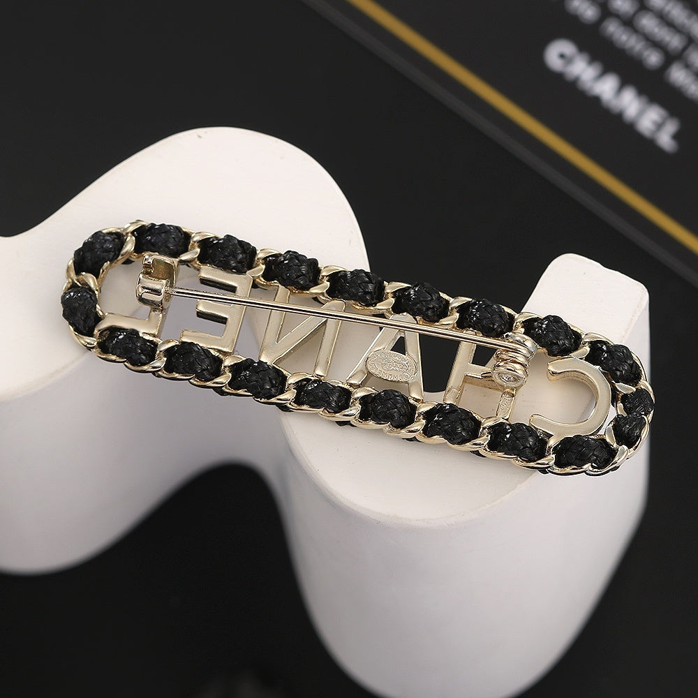 Chanel Leather Brass Brooch