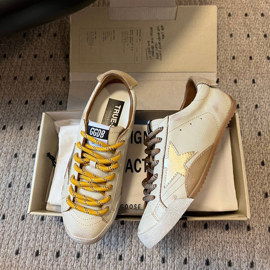 Golden Goose Vintage Distressed Sneakers #174