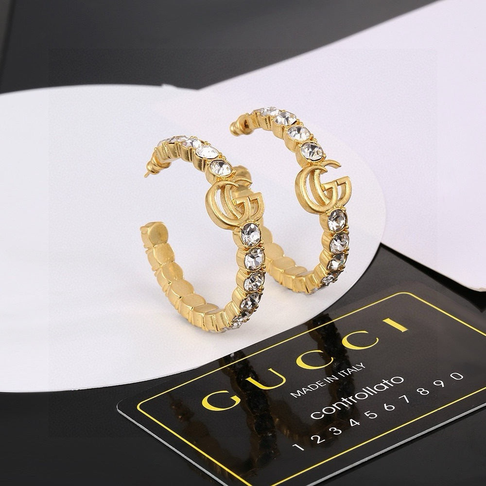 Gucci Gold-Plated Double G Earrings