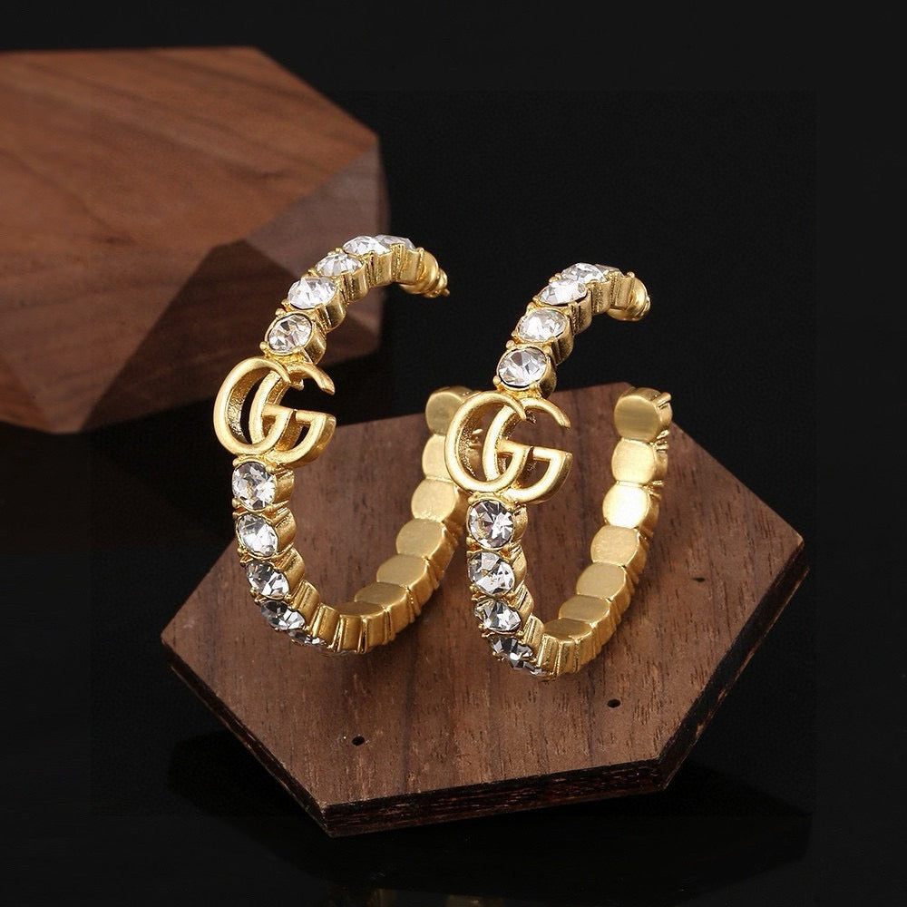 Gucci Gold-Plated Double G Earrings