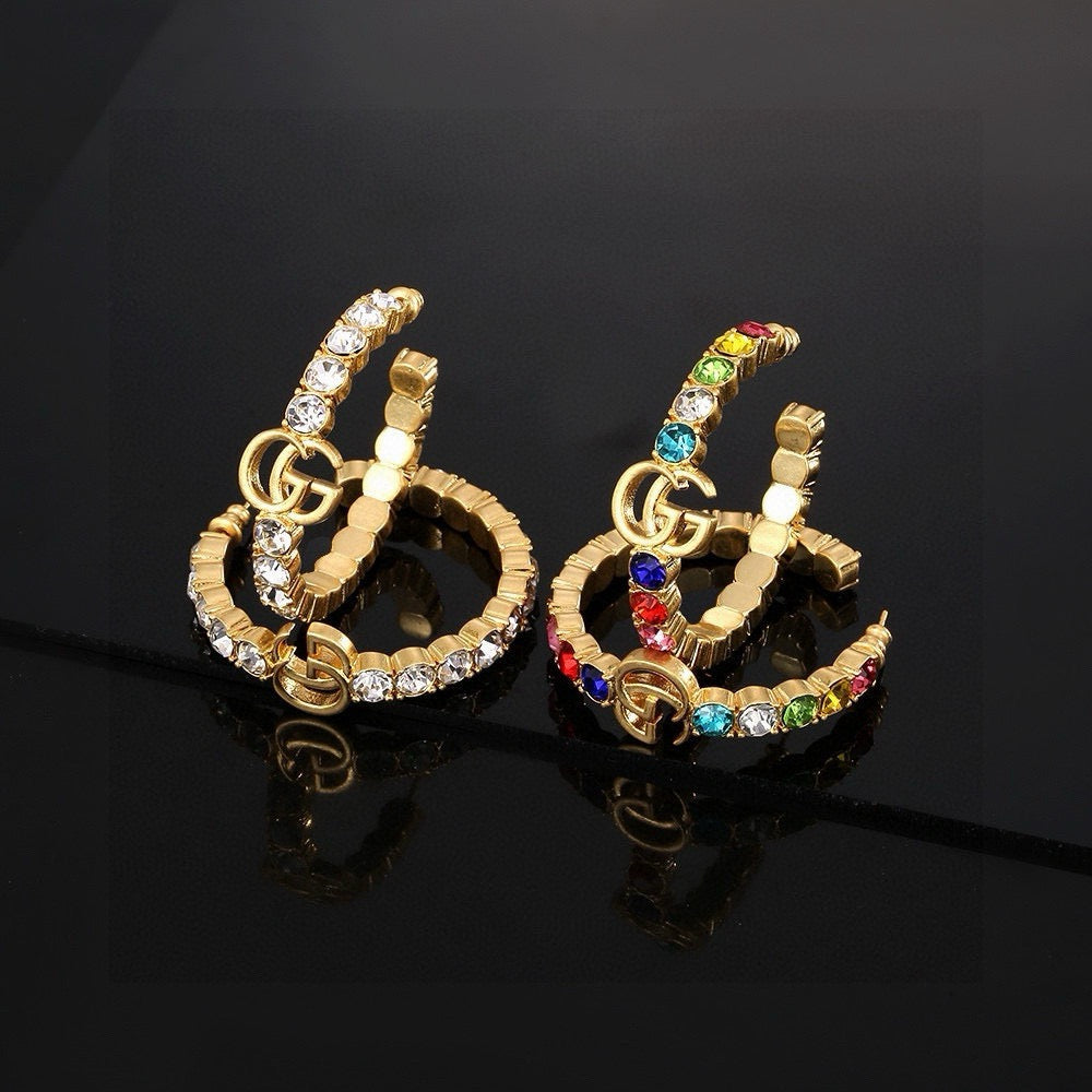 Gucci Gold-Plated Double G Earrings