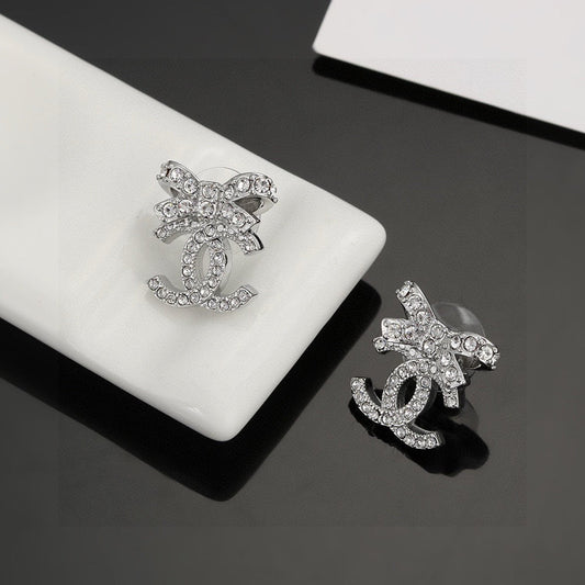 Chanel 925 Silver Bow Earrings