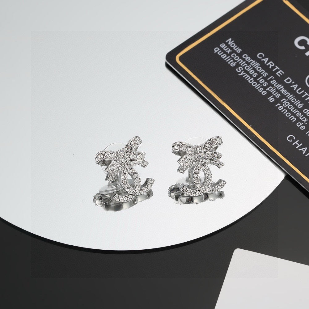 Chanel 925 Silver Bow Earrings