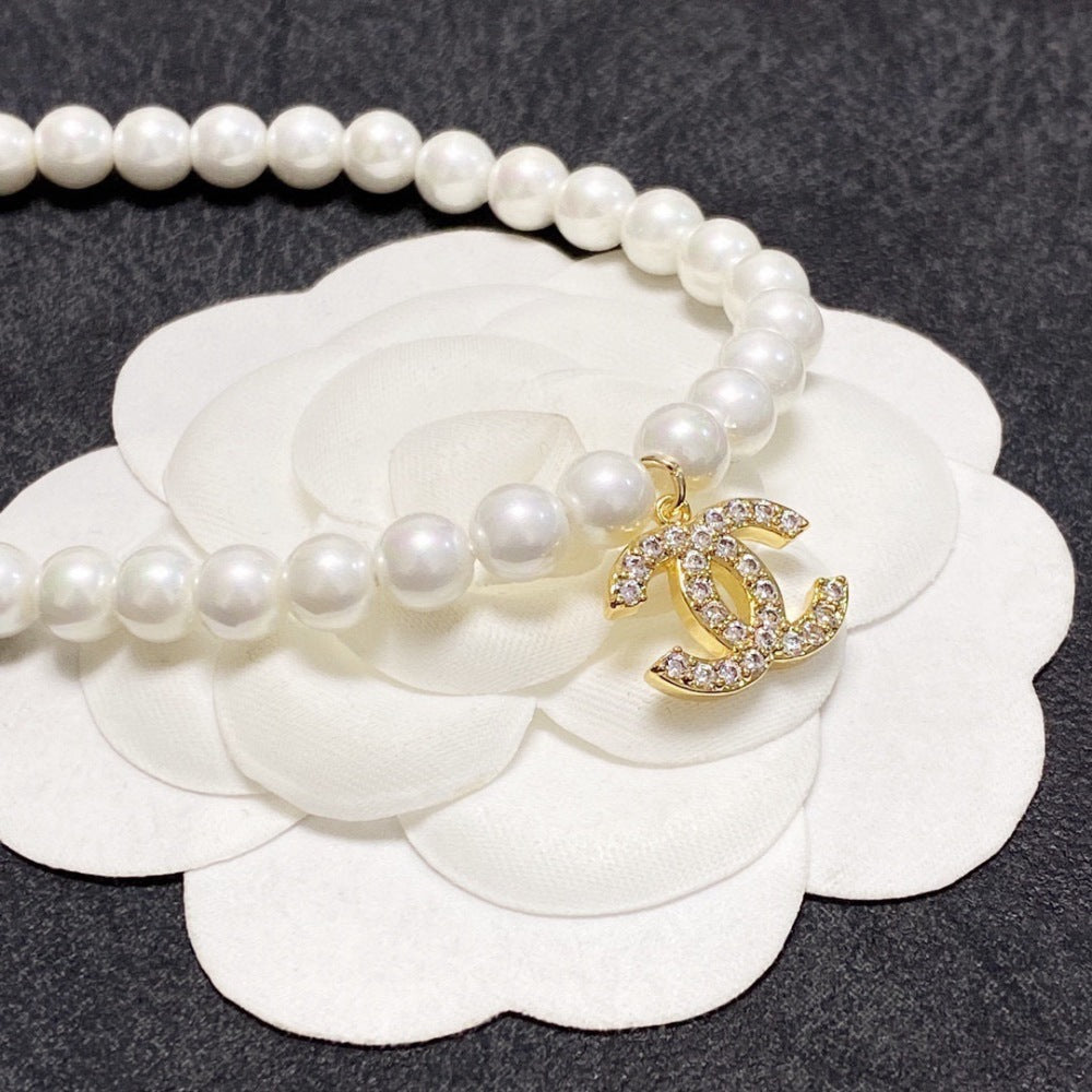 Chanel Pearl Double C Necklace